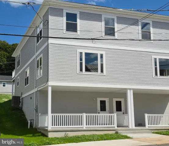 a view of a house with a deck