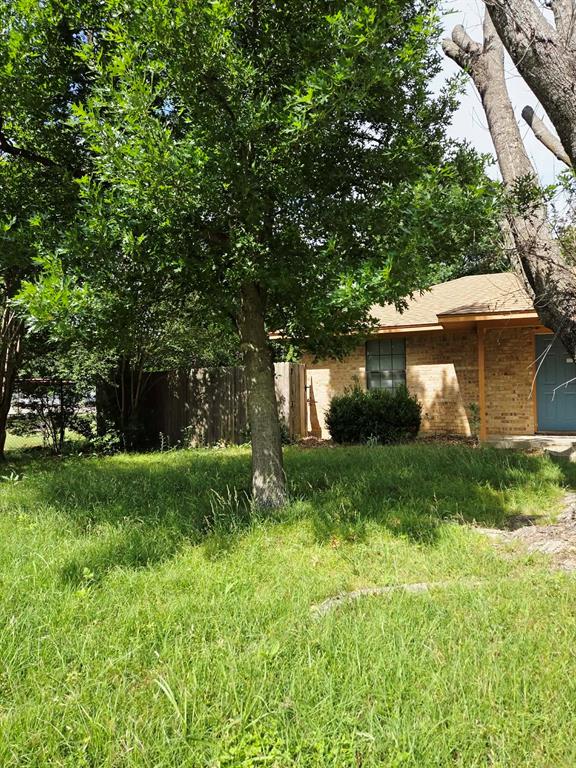 722 South Church Street Pilot Point, TX 76258 - Photo 28 of 37 a front view of a house with a yard