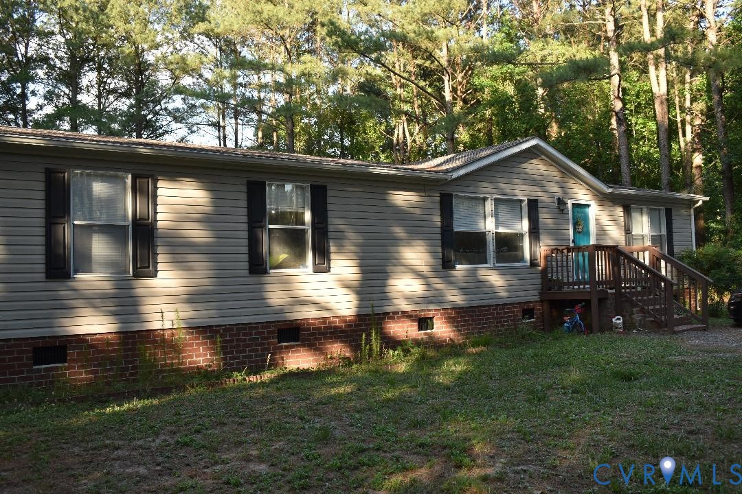 26049 Guy Place Road Courtland, VA 23837 - Photo 5 of 24 Single-story residence featuring light-colored sid