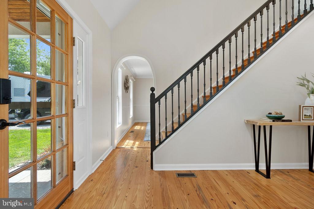 19821 Foggy Bottom Road Bluemont, VA 20135 - Photo 45 of 92 a view of a hallway with wooden floor and staircase
