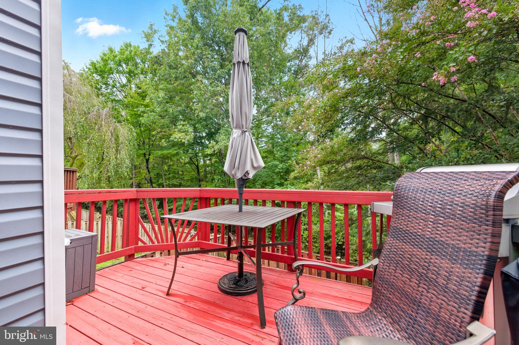 47587 Comer Square Sterling, VA 20165 - Photo 24 of 77 a view of a deck with wooden floor and outdoor seating