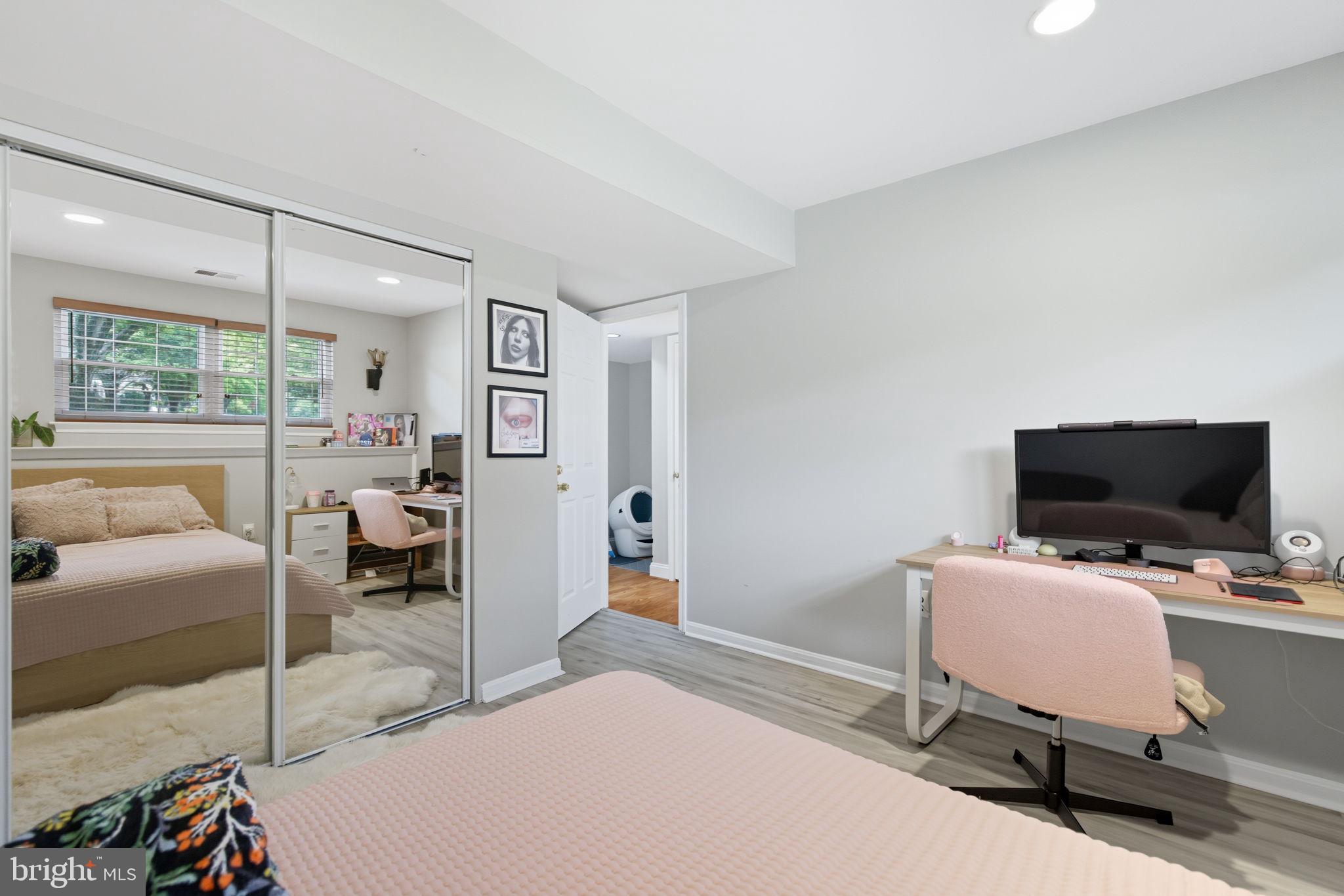 47587 Comer Square Sterling, VA 20165 - Photo 58 of 77 a bedroom with furniture and a flat screen tv