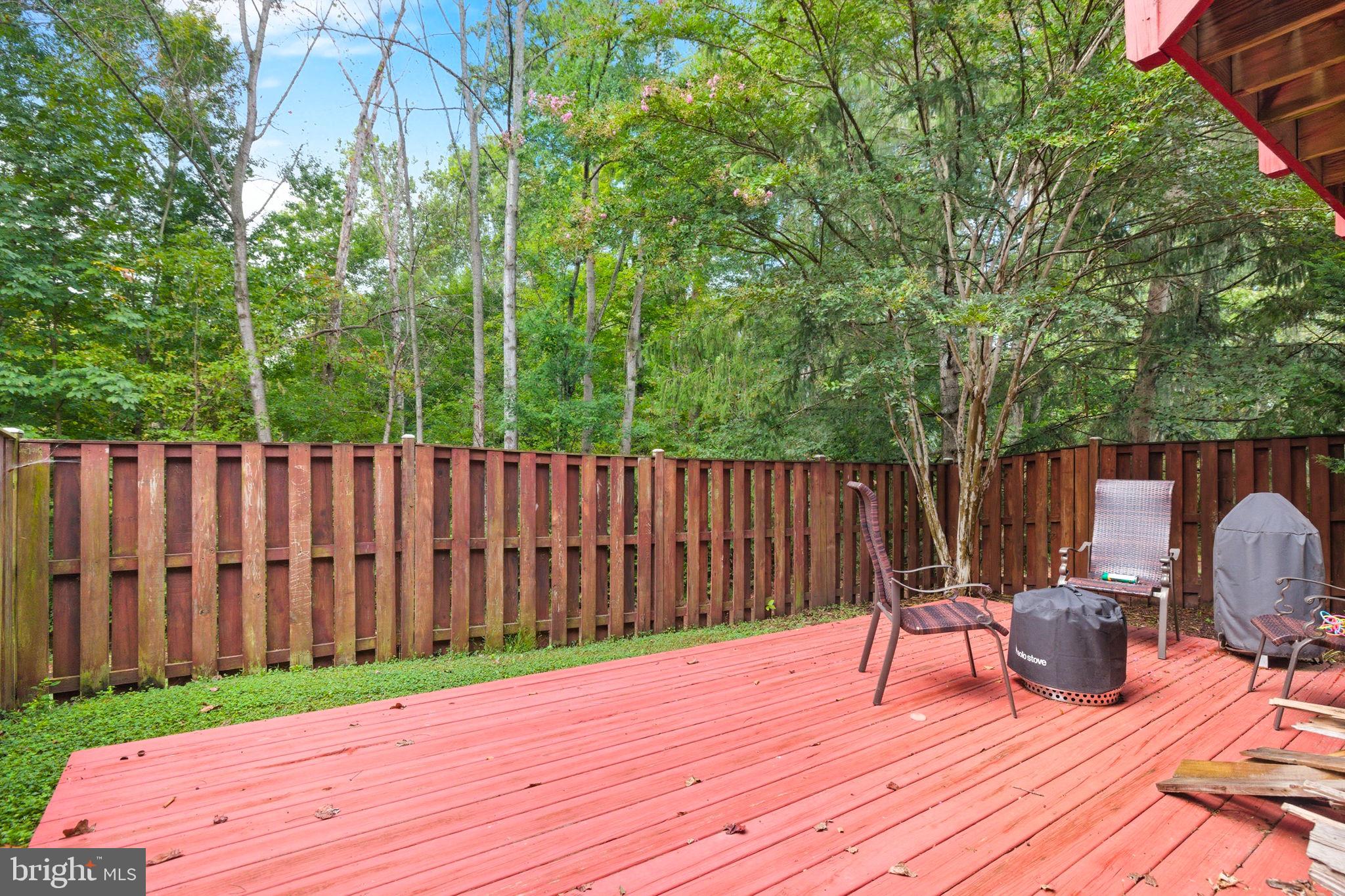 47587 Comer Square Sterling, VA 20165 - Photo 64 of 77 a view of a deck with wooden floor and outdoor seating