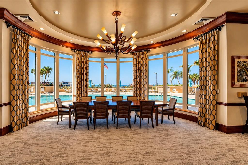3321 Sunset Key Circle, Unit 502 Punta Gorda, FL 33955 - Photo 28 of 36 a view of living room with furniture and floor to ceiling windows