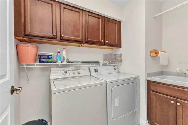 a view of a a dining room with furniture window and wooden floor