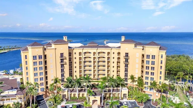a room with gym equipment and windows