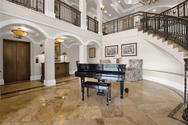 a kitchen with stainless steel appliances a sink and cabinets