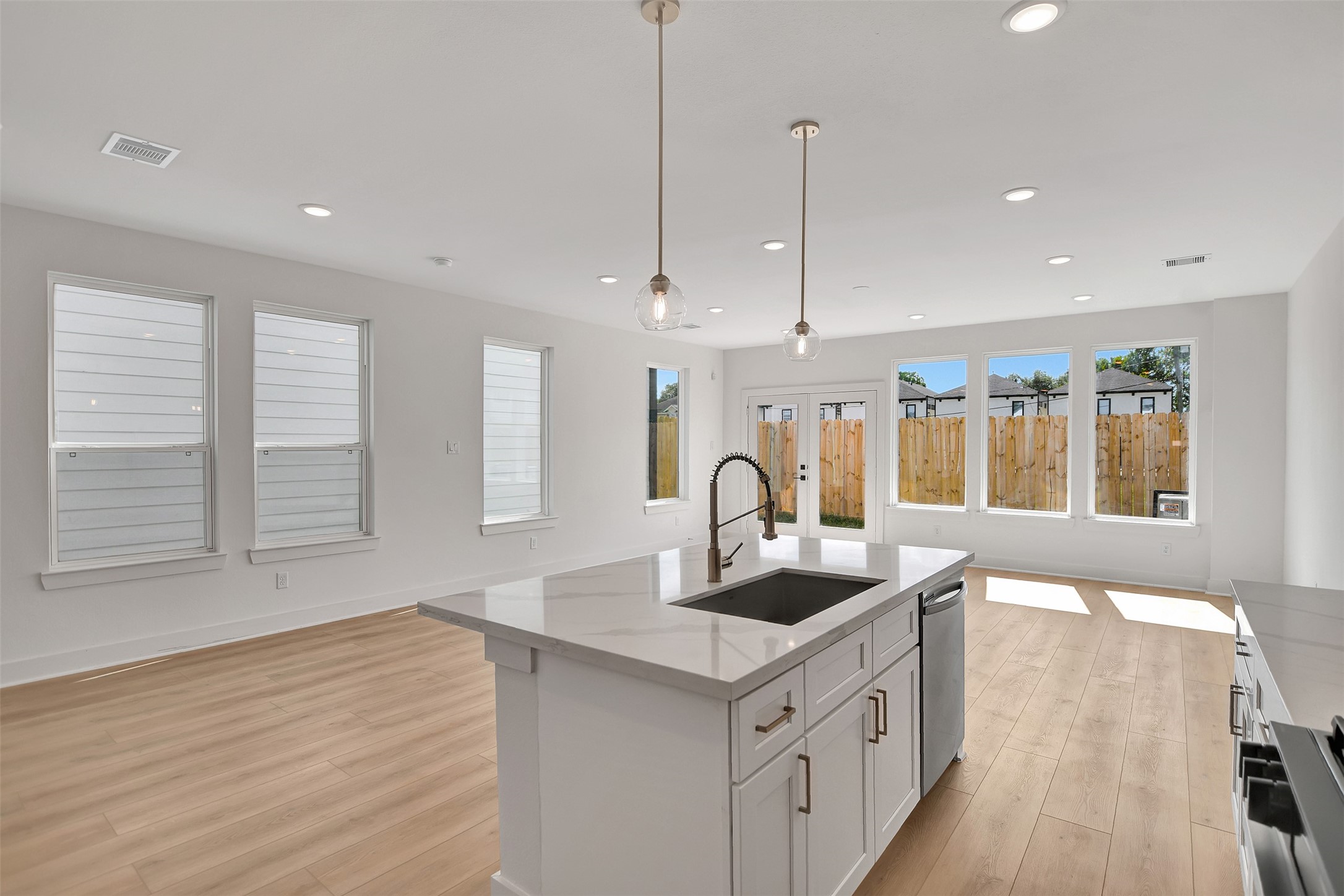 3626 Amos Street Houston, TX 77021 - Photo 14 of 43 a kitchen with stainless steel appliances granite countertop a sink a counter space and a window