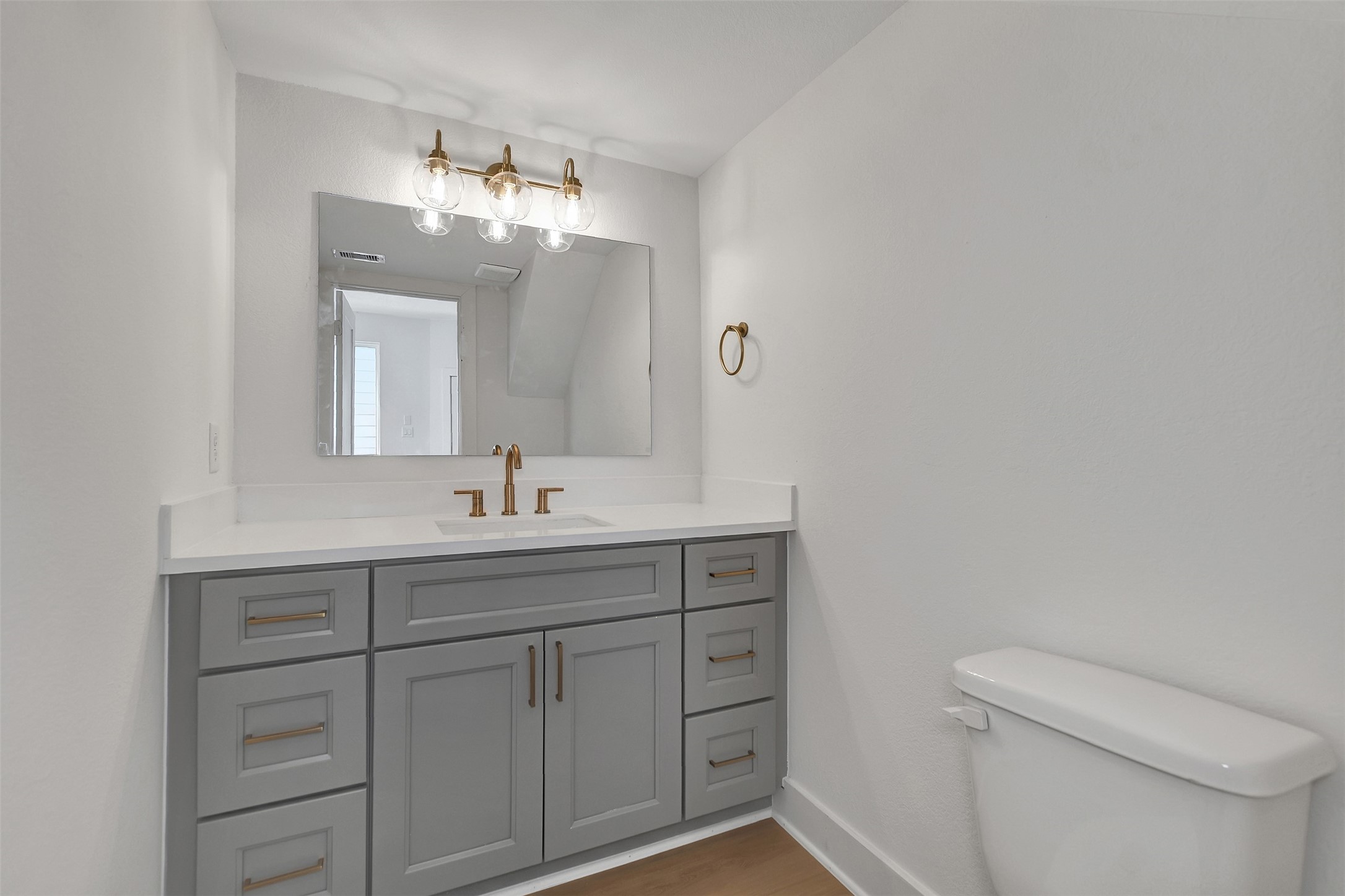 3626 Amos Street Houston, TX 77021 - Photo 24 of 43 a bathroom with a toilet sink and mirror