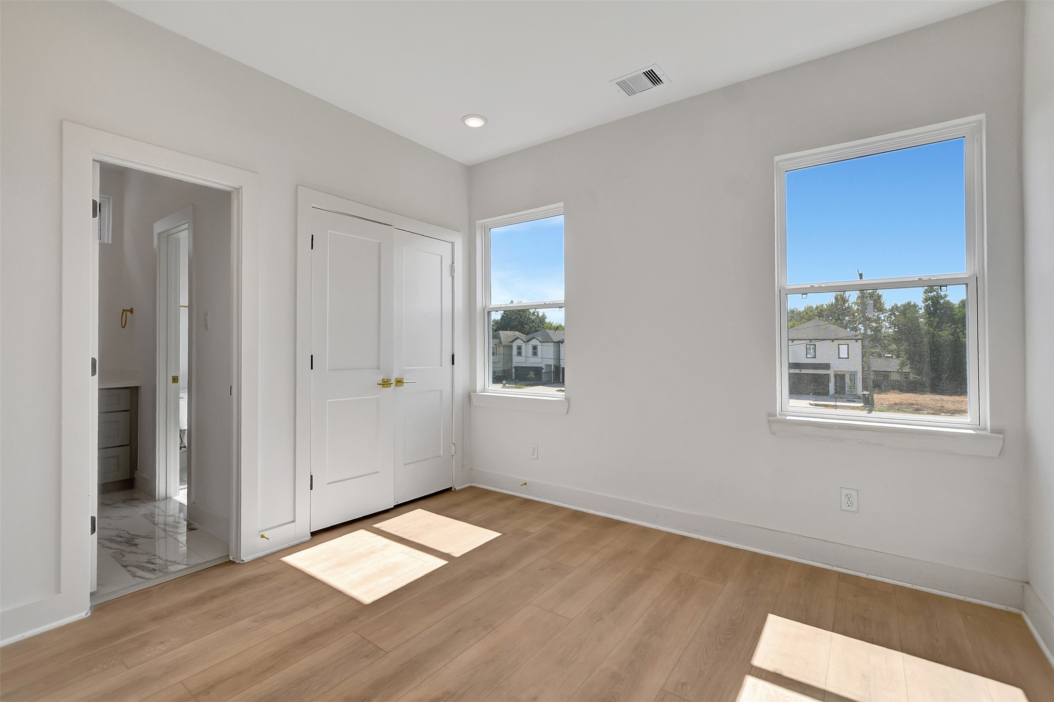 3626 Amos Street Houston, TX 77021 - Photo 34 of 43 a view of empty room with wooden floor and fan