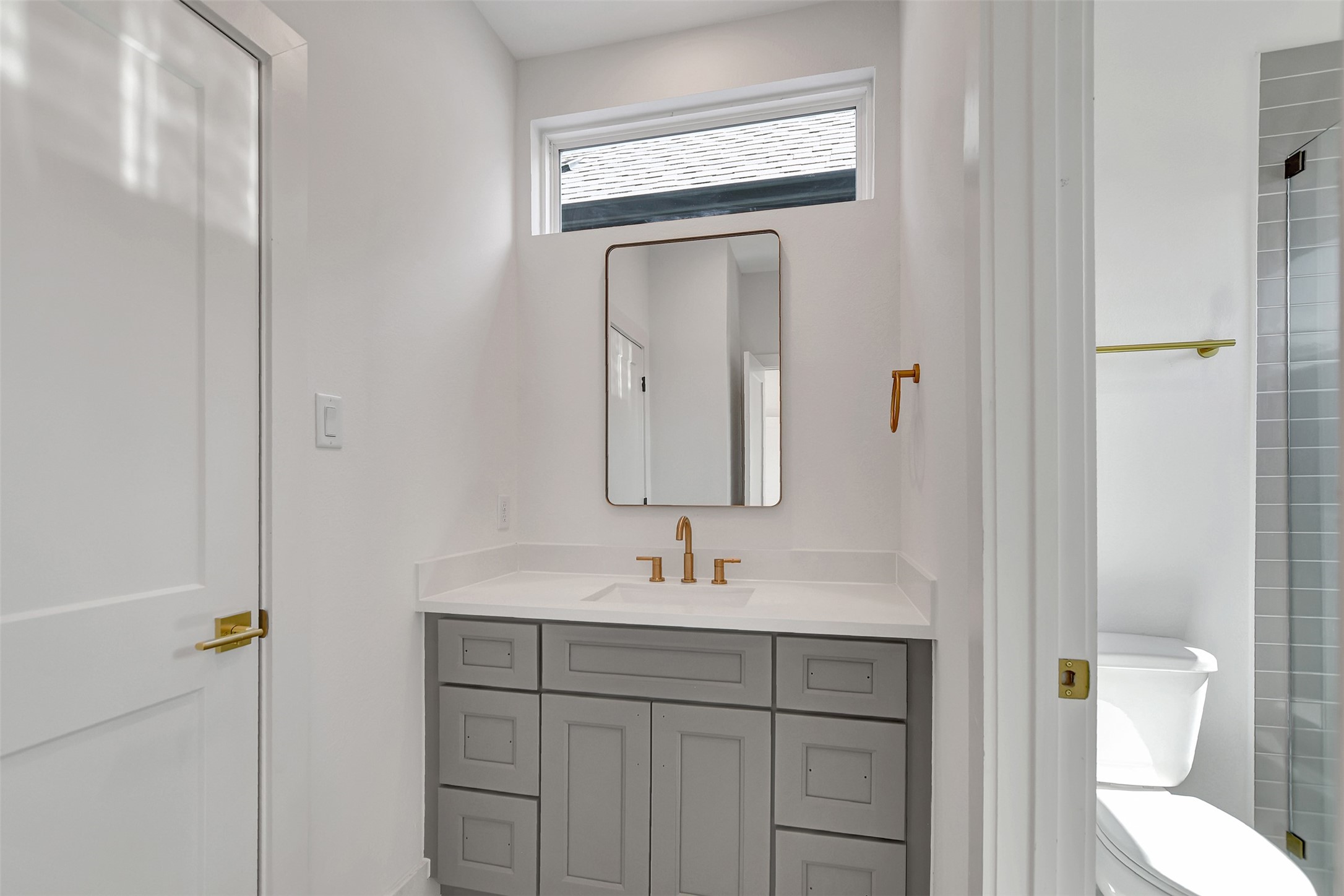 3626 Amos Street Houston, TX 77021 - Photo 35 of 43 a bathroom with a toilet sink and mirror