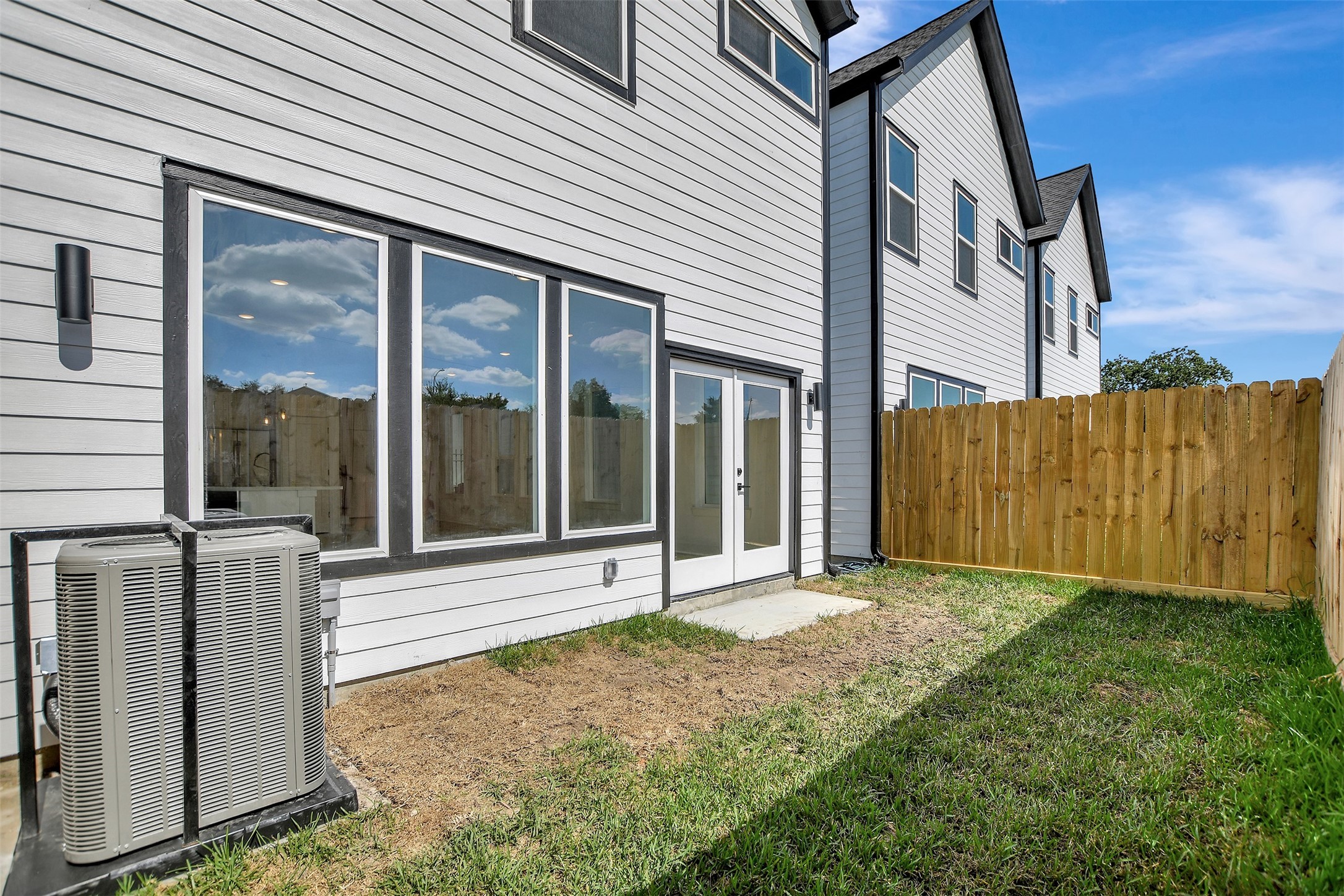 3626 Amos Street Houston, TX 77021 - Photo 43 of 43 a view of a house with backyard and wooden fence