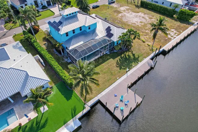 an aerial view of a house with a garden