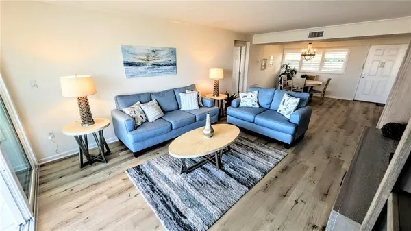 a living room with furniture and a couch