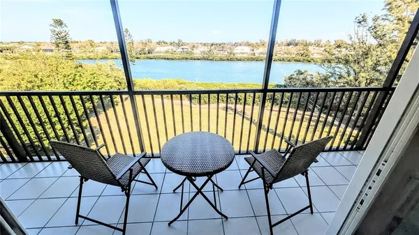 a view of a chairs on the roof deck