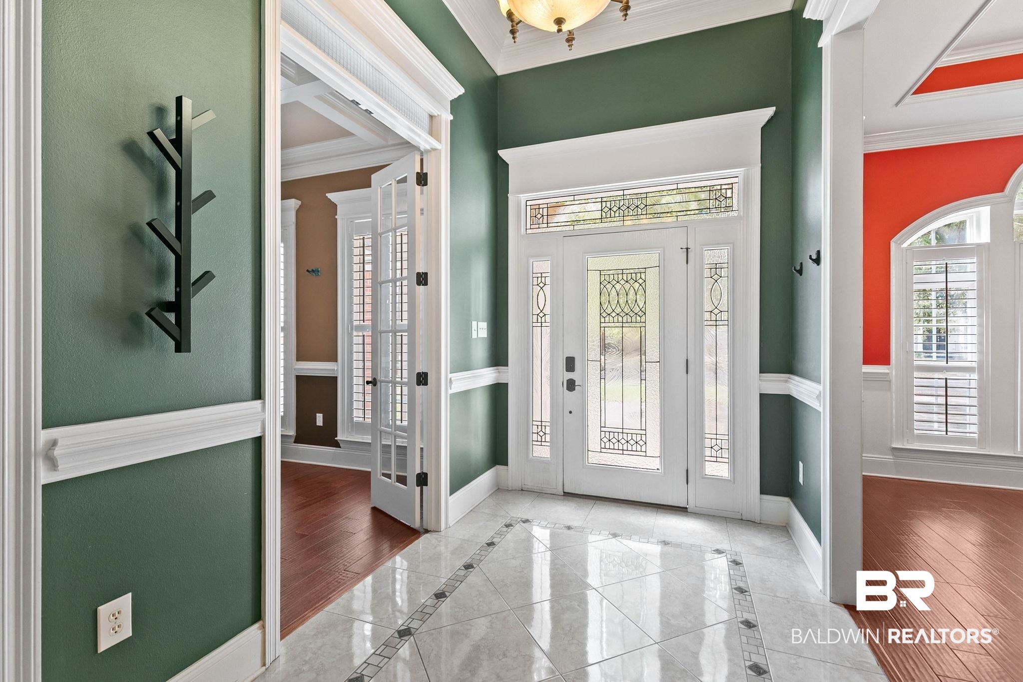 3668 Claridge Road North Mobile, AL 36608 - Photo 23 of 100 Foyer featuring crown molding, inlaid floor details, and plenty of natural light