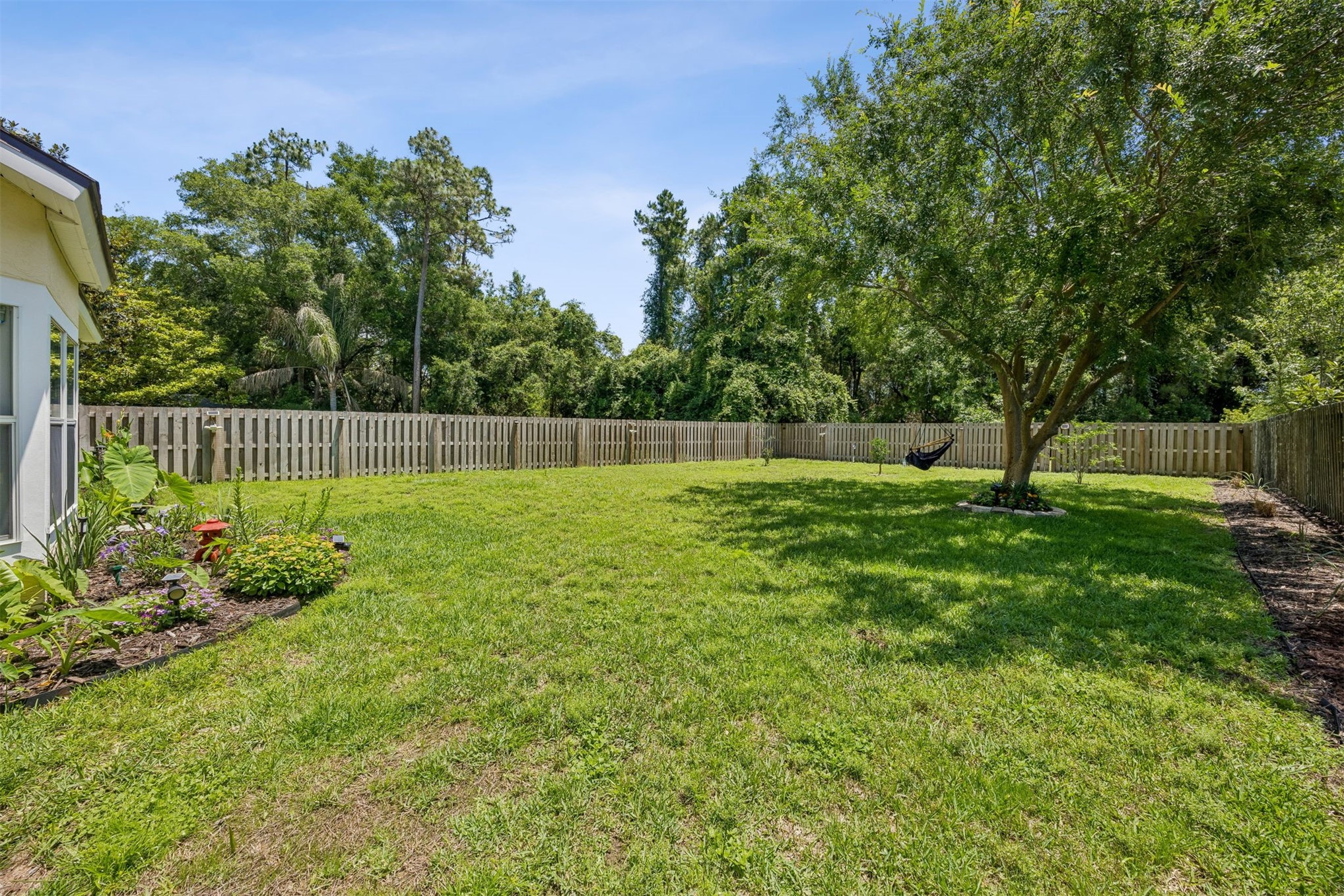 86107 Remsenburg Drive Fernandina Beach, FL 32034 - Photo 31 of 58 a view of green field with fence