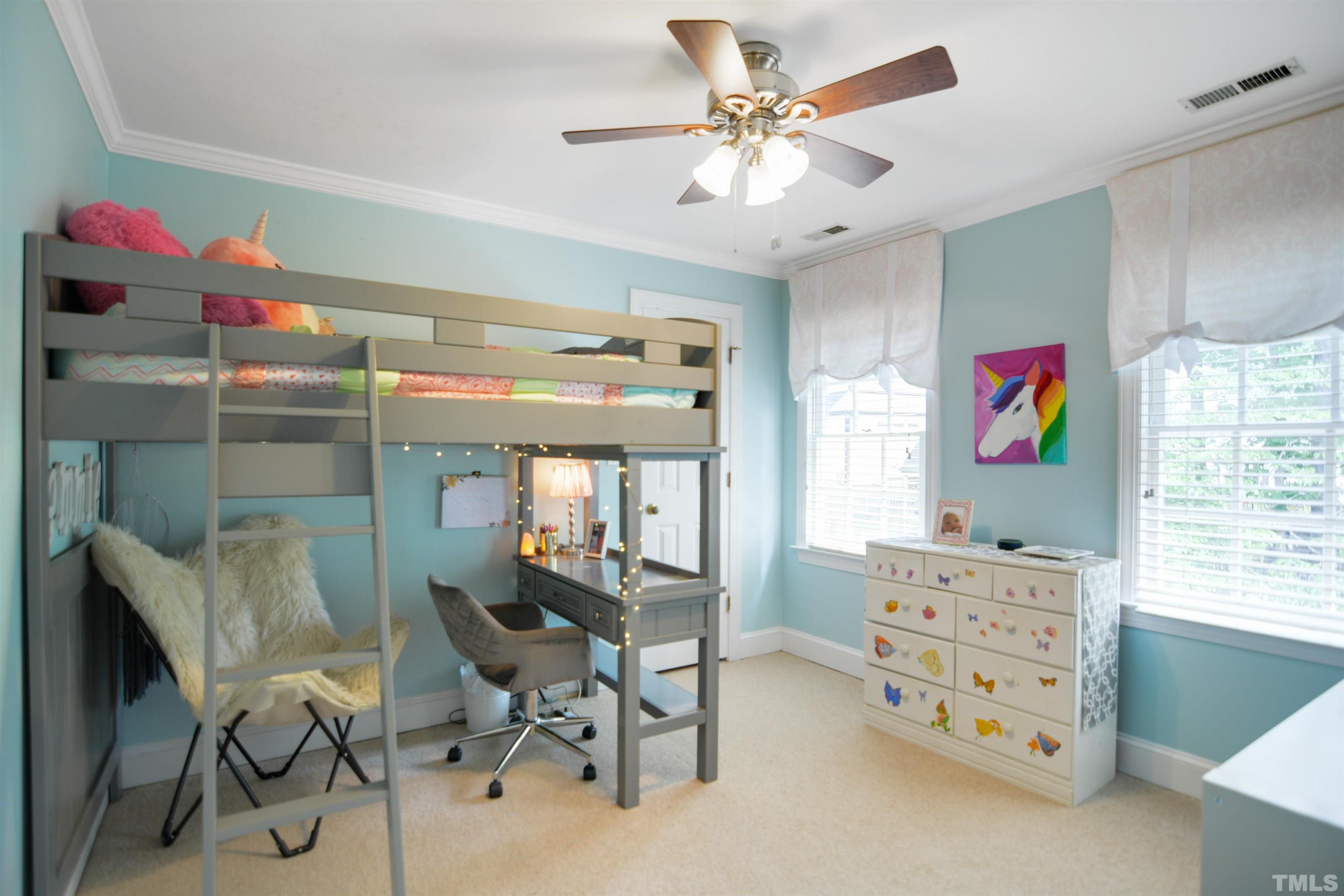 3005 Dunkirk Drive Raleigh, NC 27613 - Photo 19 of 35 a view of a workspace with furniture and a window