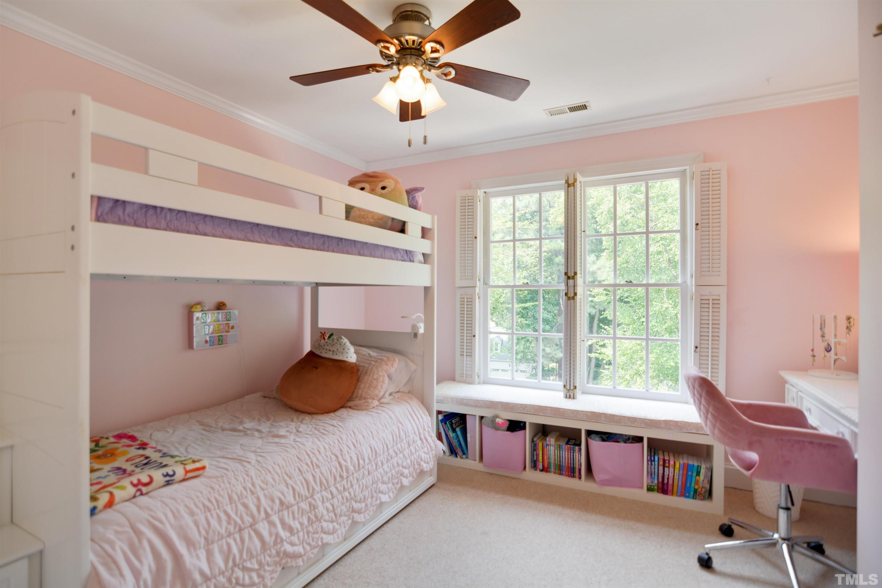 3005 Dunkirk Drive Raleigh, NC 27613 - Photo 20 of 35 a bedroom with a bed and a large window with the outer view