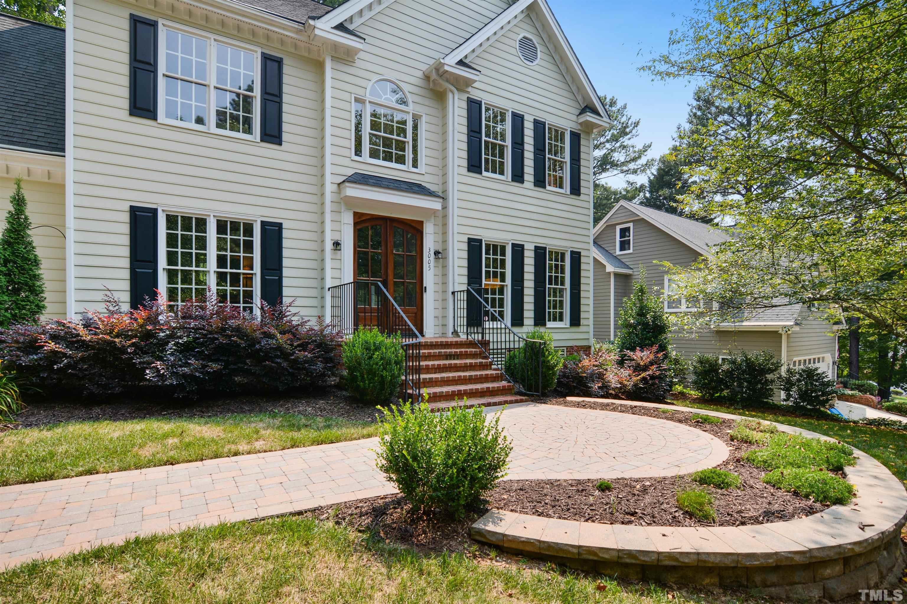 3005 Dunkirk Drive Raleigh, NC 27613 - Photo 3 of 35 a view of a house with a garden