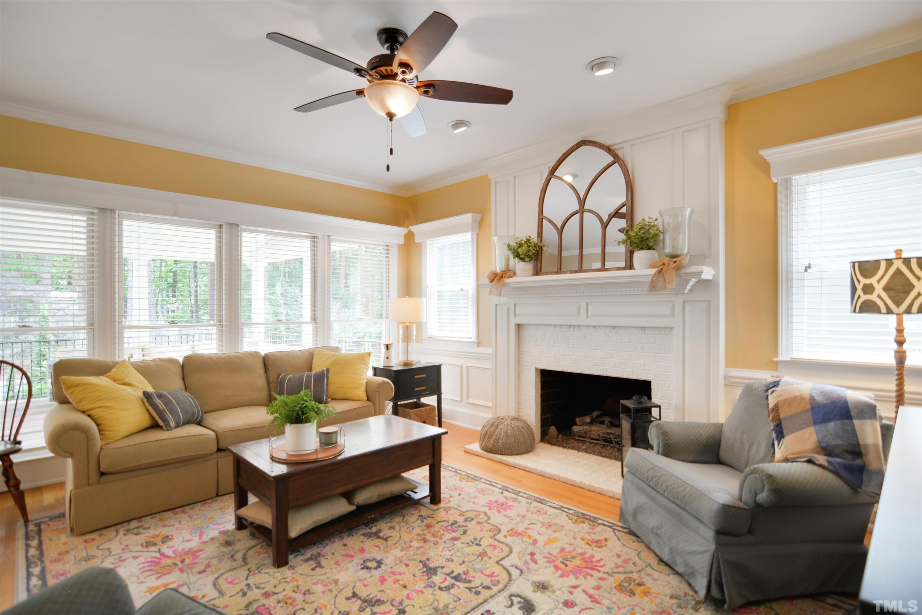 3005 Dunkirk Drive Raleigh, NC 27613 - Photo 8 of 35 a living room with furniture fireplace and window
