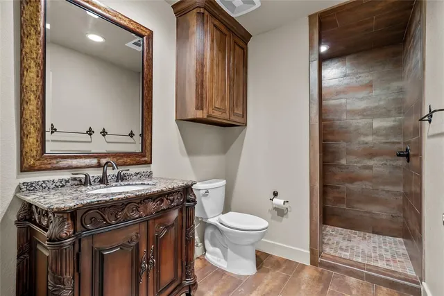 en empty room with ceiling fan and fan