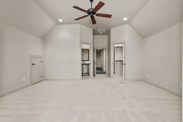 a bathroom with a toilet sink vanity tub and shower