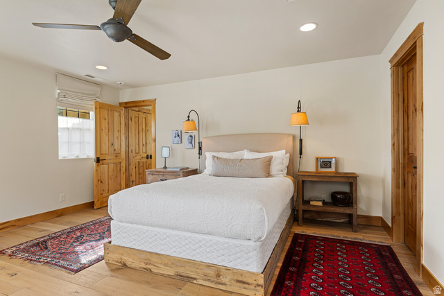 105 River Bend Circle, Unit 105 Springdale, UT 84767 - Photo 27 of 56 Interior room featuring wood-finish flooring, wood trim, and wood doors