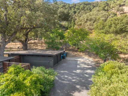 a backyard of a house with lots of green space