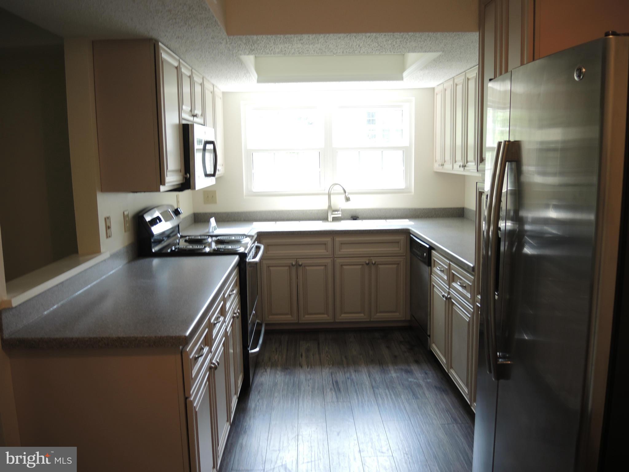 114 Fort Evans Road Southeast, Unit D Leesburg, VA 20175 - Photo 9 of 15 Gourmet Kitchen/New cabinets/appliances/window/etc