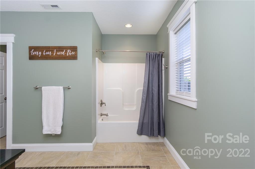 225 Nut Hatch Loop Arden, NC 28704 - Photo 32 of 48 a view of a hallway with window