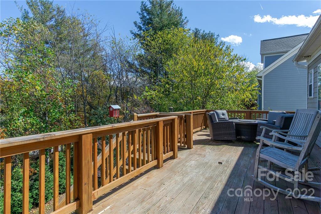225 Nut Hatch Loop Arden, NC 28704 - Photo 37 of 48 a balcony with wooden floor and outdoor space