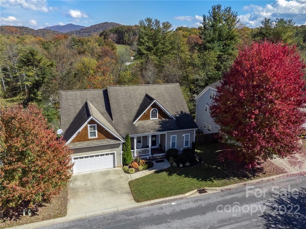 225 Nut Hatch Loop Arden, NC 28704 - Photo 42 of 48 front view of house with a yard