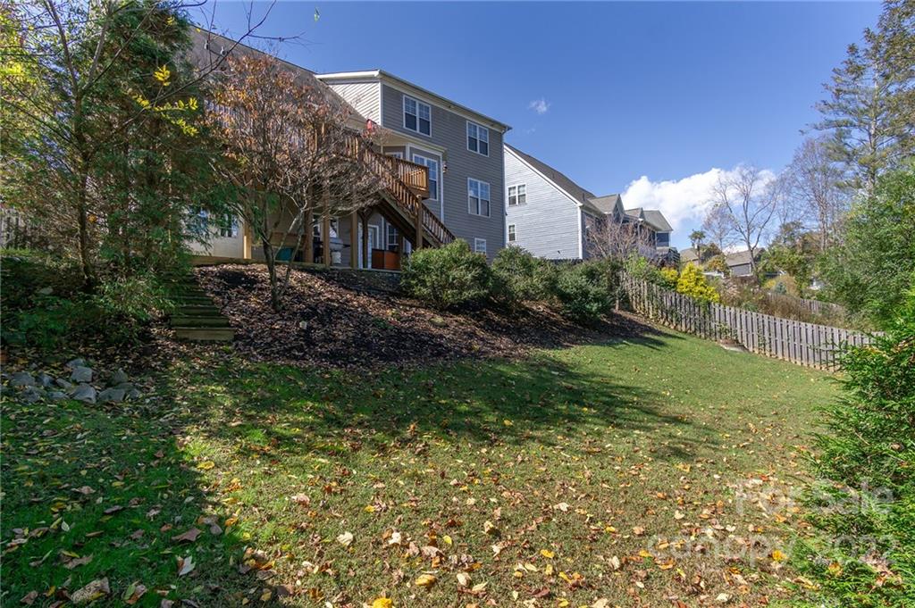 225 Nut Hatch Loop Arden, NC 28704 - Photo 48 of 48 a view of a house with a yard
