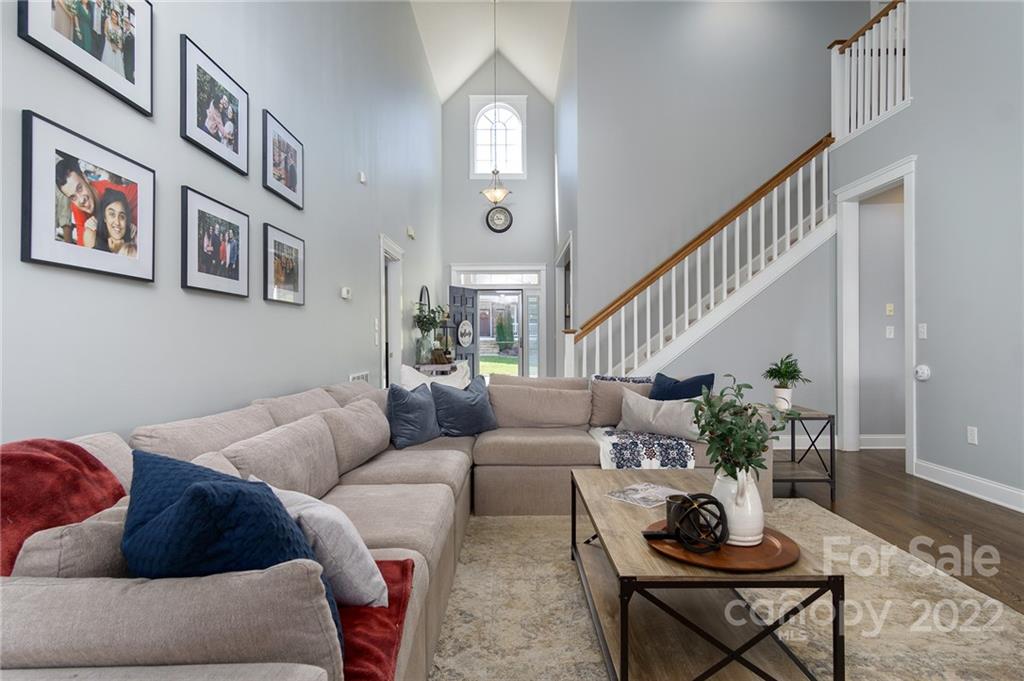 225 Nut Hatch Loop Arden, NC 28704 - Photo 8 of 48 a living room with furniture and a potted plant