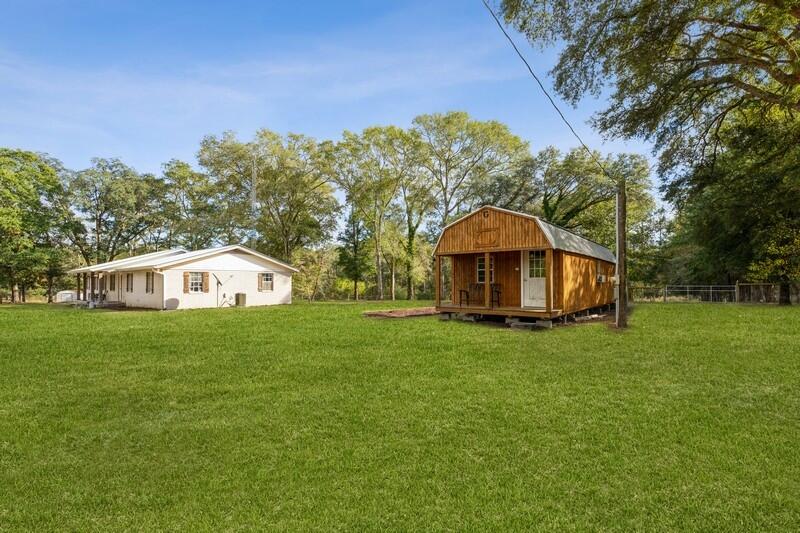 2028 Faulk Ferry Road Baker, FL 32531 - Photo 27 of 43 a view of a house with a yard