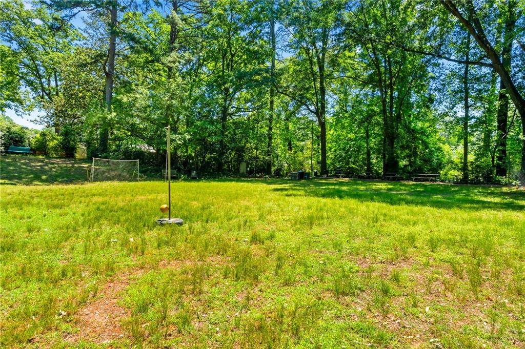 1981 North Decatur Road Atlanta, GA 30307 - Photo 17 of 20 a swimming pool with trees in the background