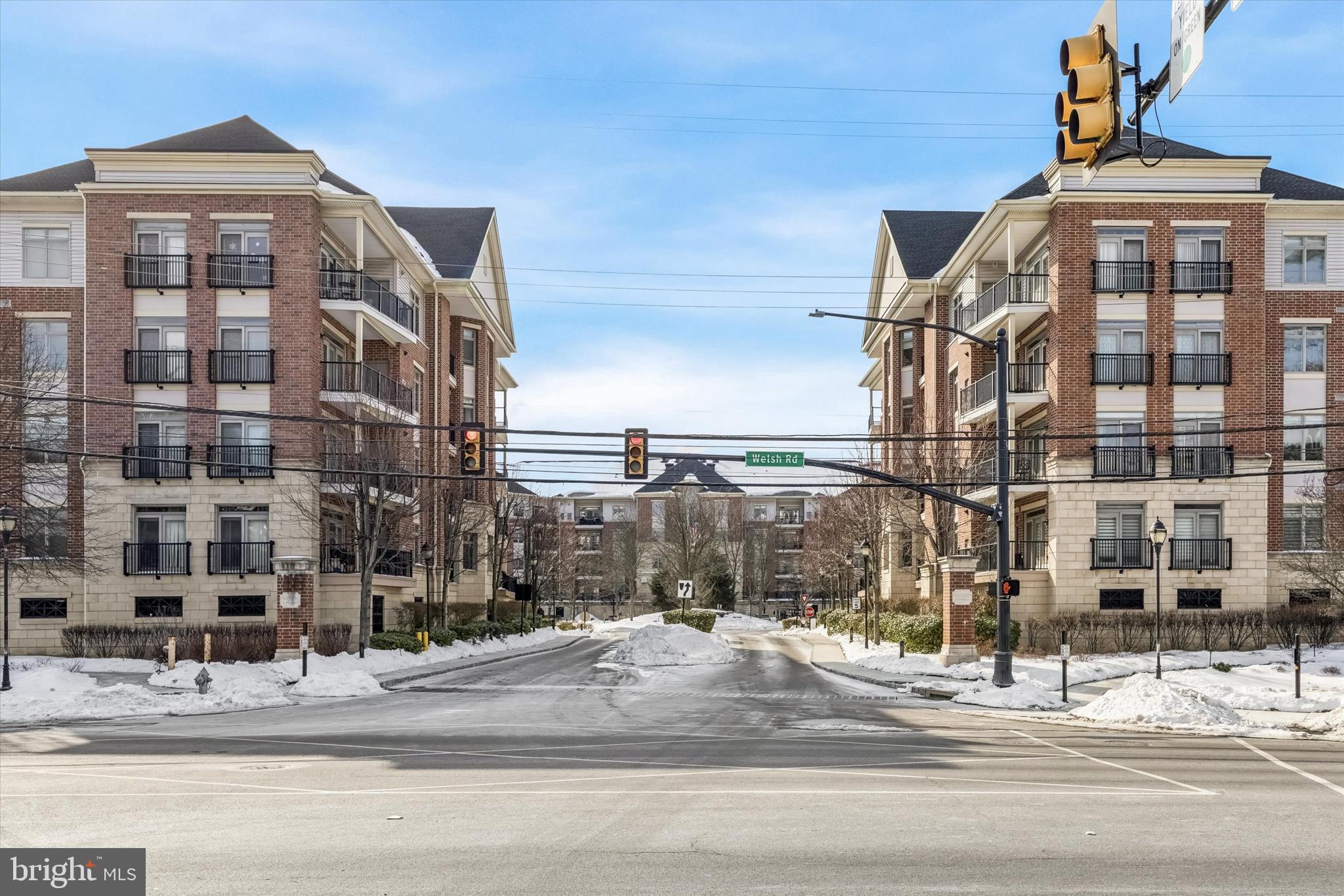 a tall building sitting on the side of a street