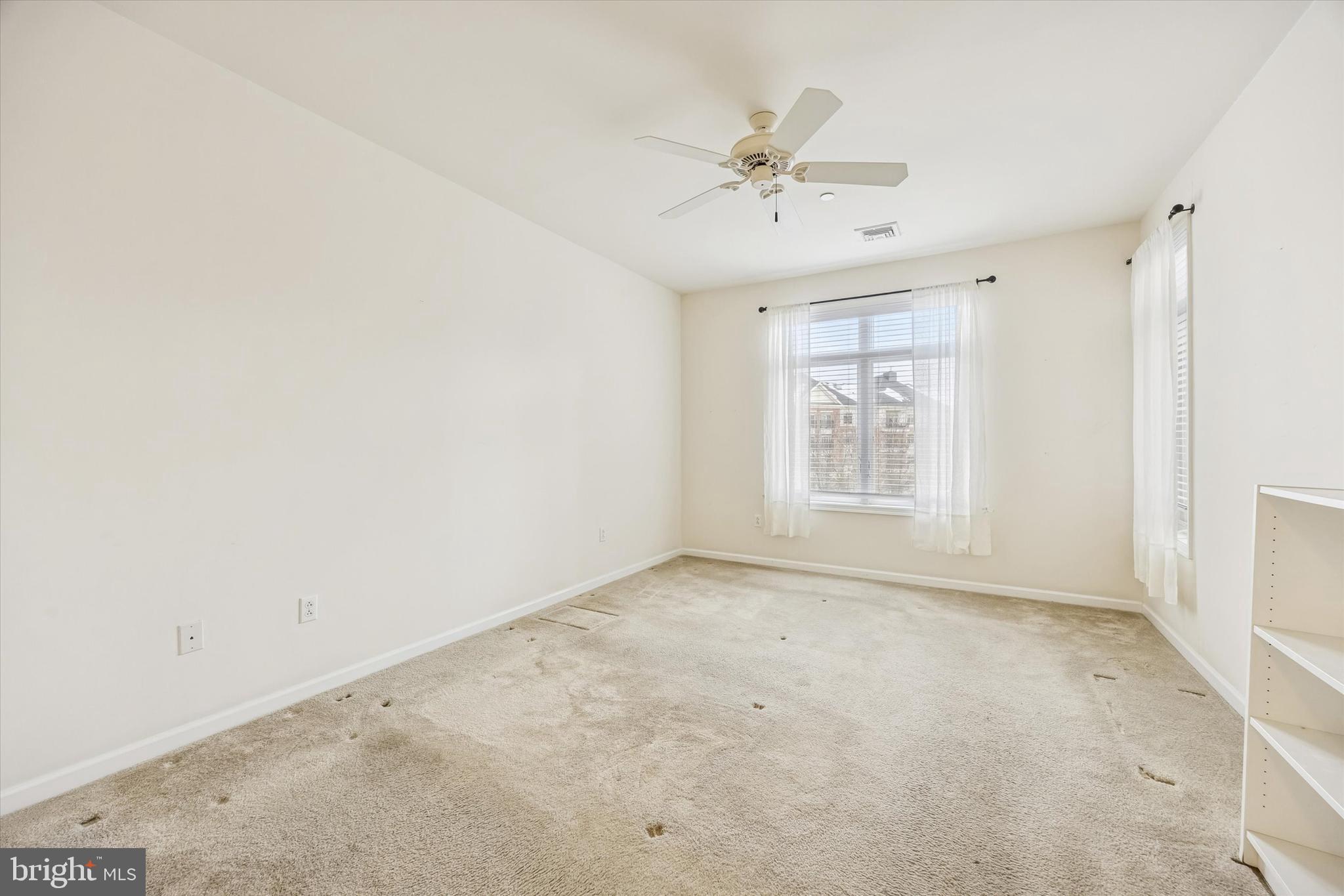 427 Carson Terrace Huntingdon Valley, PA 19006 - Photo 10 of 19 a view of an empty room with a window