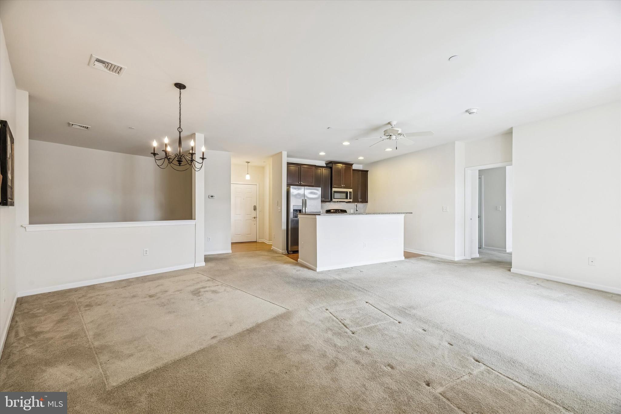 427 Carson Terrace Huntingdon Valley, PA 19006 - Photo 6 of 19 a view of a kitchen with a sink and white cabinets