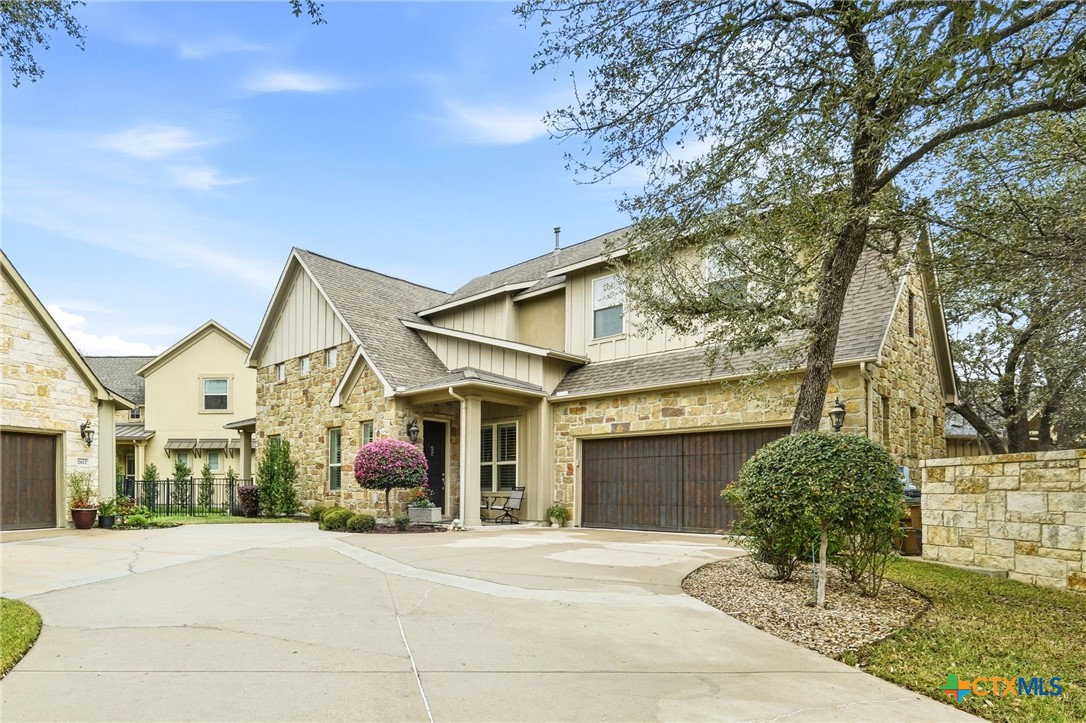 2608 Barbera Pass Austin, TX 78748 - Photo 1 of 39 a front view of a house with garden