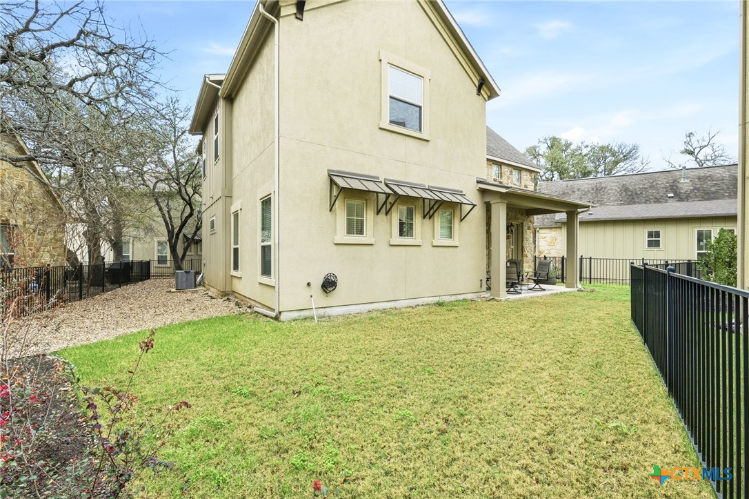 2608 Barbera Pass Austin, TX 78748 - Photo 26 of 39 a view of a house with backyard and sitting area