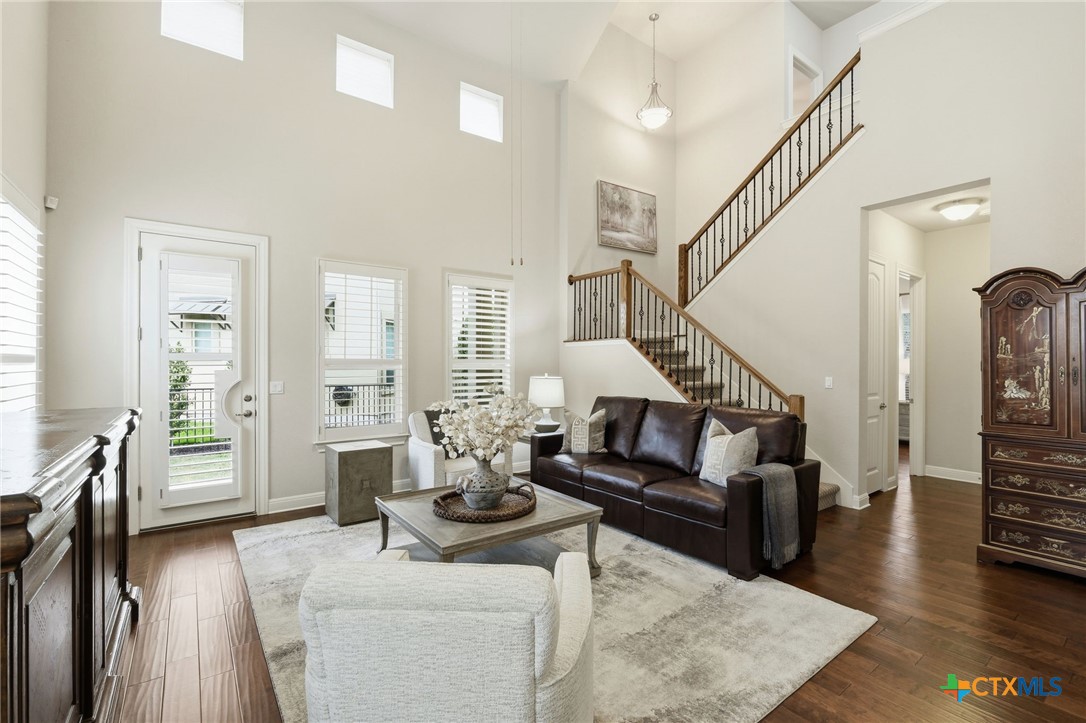 2608 Barbera Pass Austin, TX 78748 - Photo 5 of 39 a living room with furniture fireplace and wooden floor