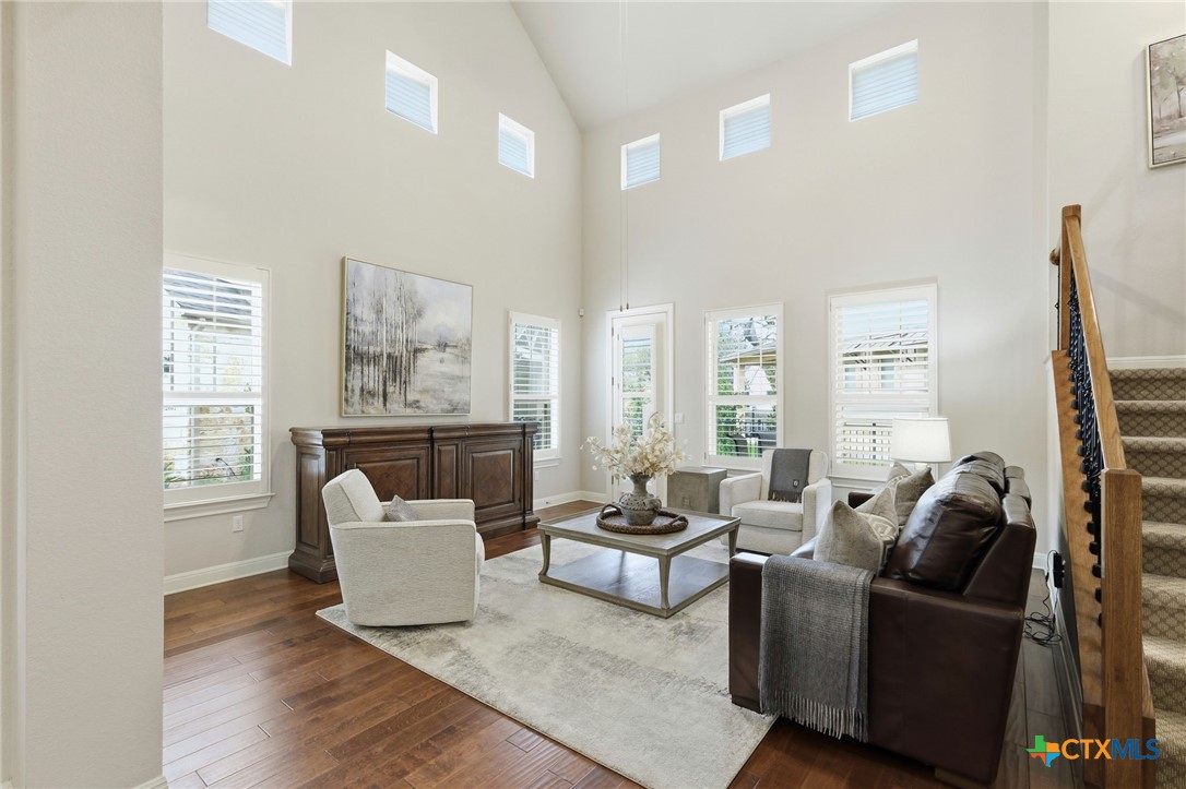2608 Barbera Pass Austin, TX 78748 - Photo 6 of 39 a living room with furniture and a large window