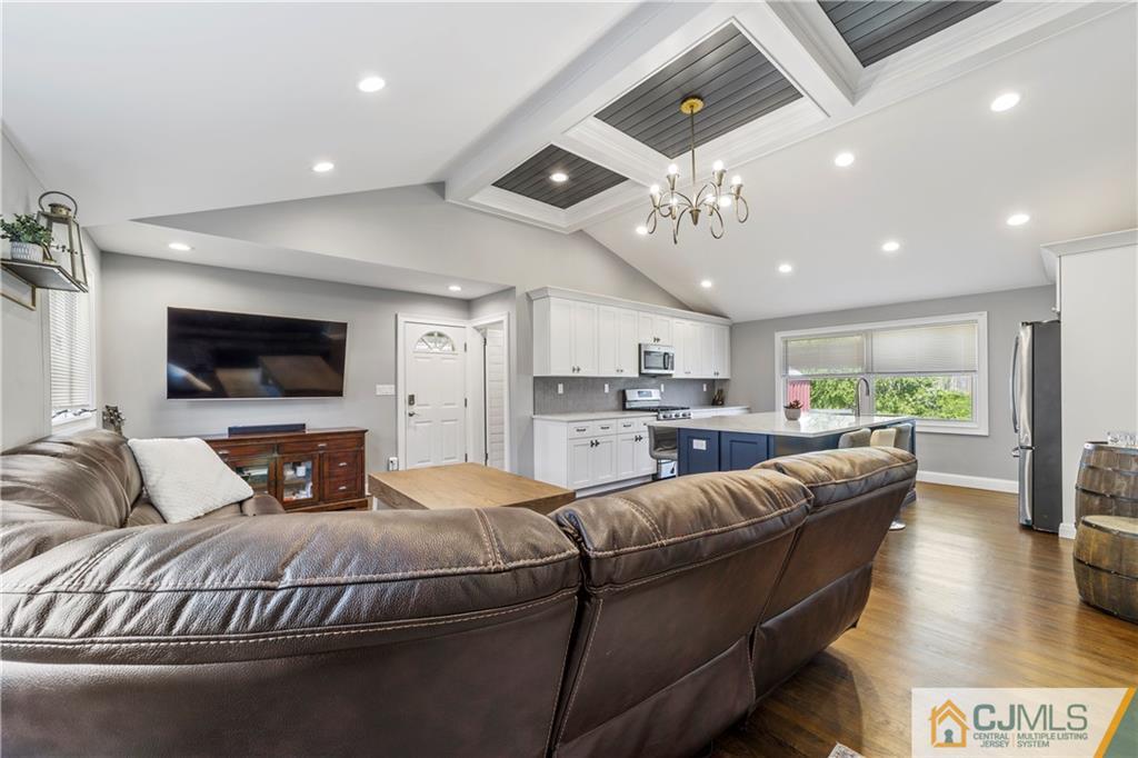 25 Princeton Road Old Bridge, NJ 08859 - Photo 6 of 26 a living room with furniture and a flat screen tv