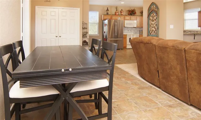 a view of a dining room with furniture