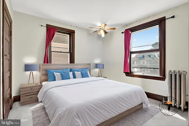 a bathroom with a tub and shower