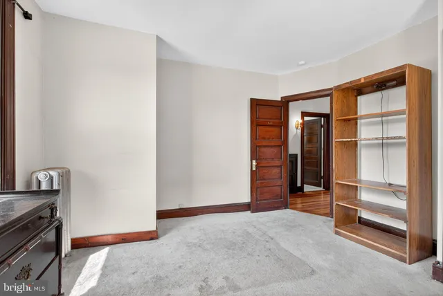 a bathroom with a bathtub a toilet and a shower