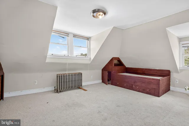 a room with furniture and a window