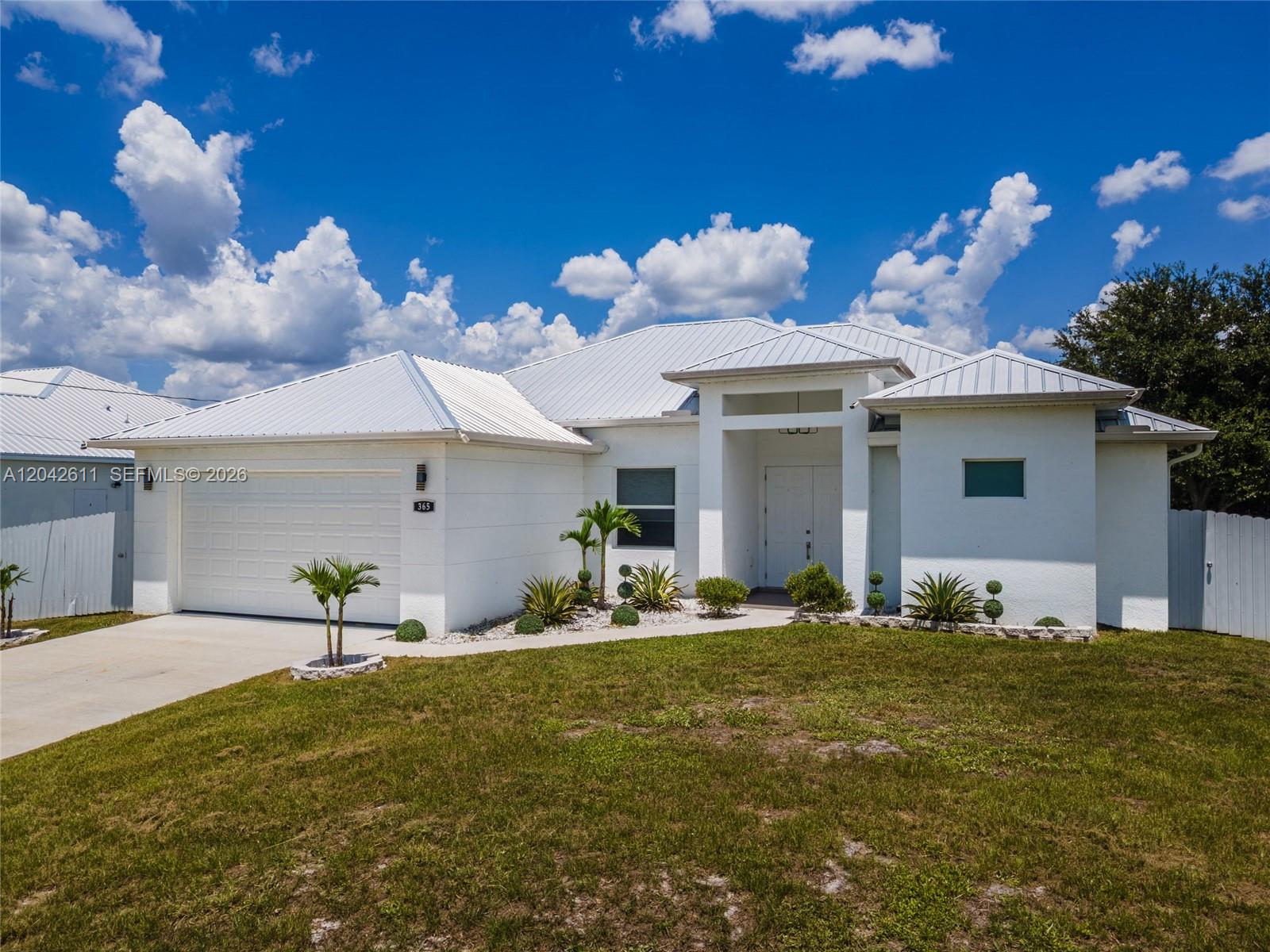 365 Ranier Avenue Lehigh Acres, FL 33974 - Photo 3 of 50